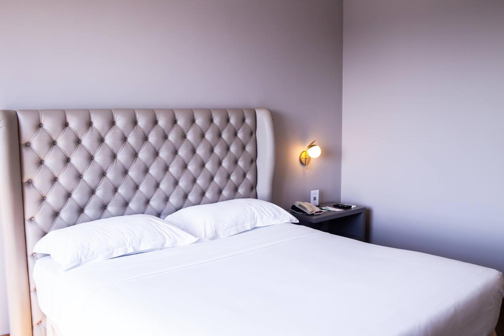 Ouro Minas Hotel Belo Horizonte, Dolce By Wyndham Eksteriør bilde A bedroom at the hotel